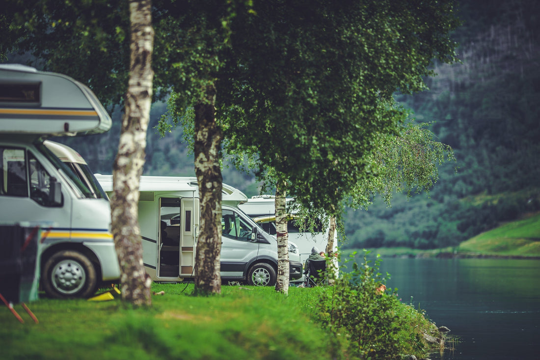 RV resort near a lake with RVs parked along waterfront sites